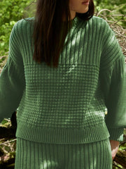 Moss textured knit round-neck pullover sweater with waffle and rib knit details.