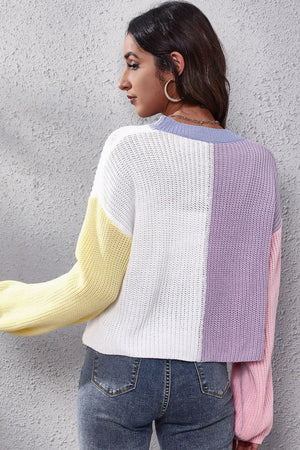 Panelled ribbed knit cardigan in pastel colorblock with crew neck and long sleeves.