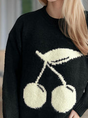 Black knit sweater with cream cherry motif, crew neck, long sleeves.