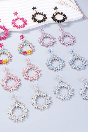 Floral halo drop earrings in multicolor, hot pink, white, pink purple, silver, light blue, blush pink, and black.