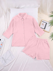 Pink gauze cotton resort shirt and shorts set with button front and elastic waist shorts.