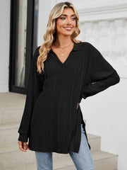 Black ribbed knit collared tunic top with long sleeves and slit hem