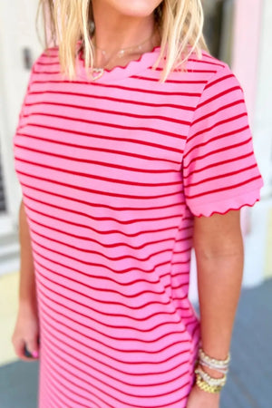 Pink striped maxi tee dress with red stripes and scalloped trim.