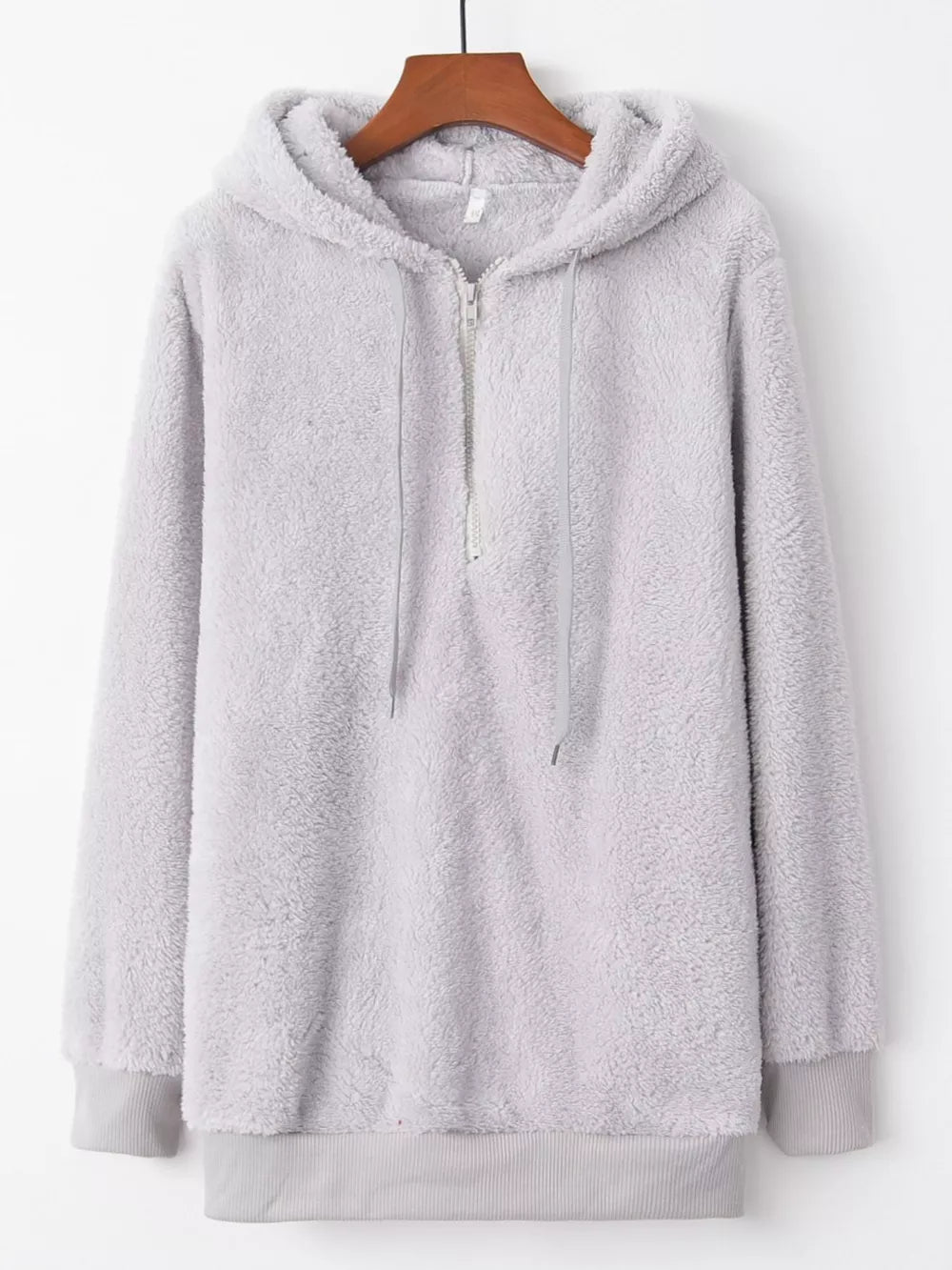 Light gray cozy half-zip fleece hoodie with drawstring and ribbed cuffs.