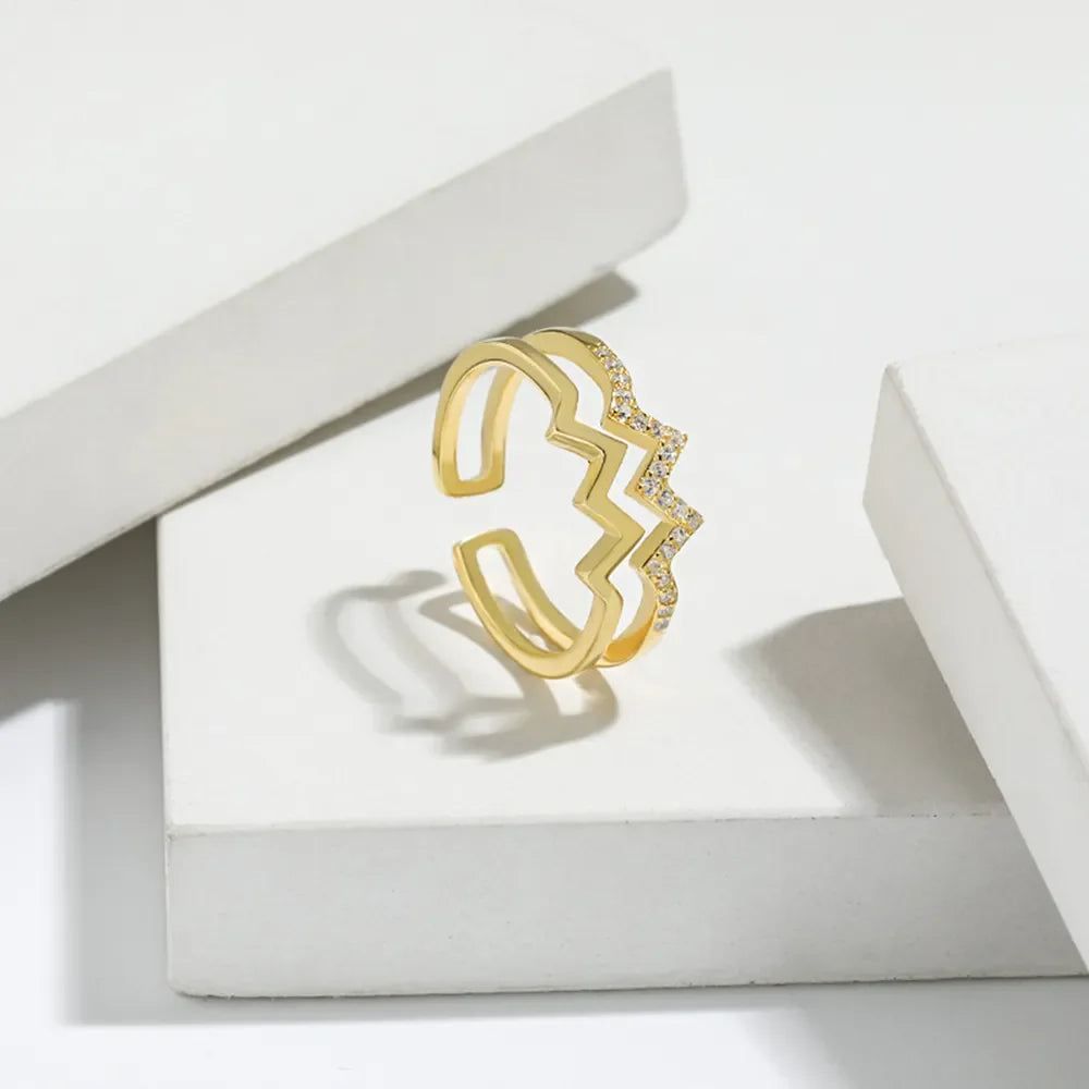 Gold zigzag split band ring with pave crystals