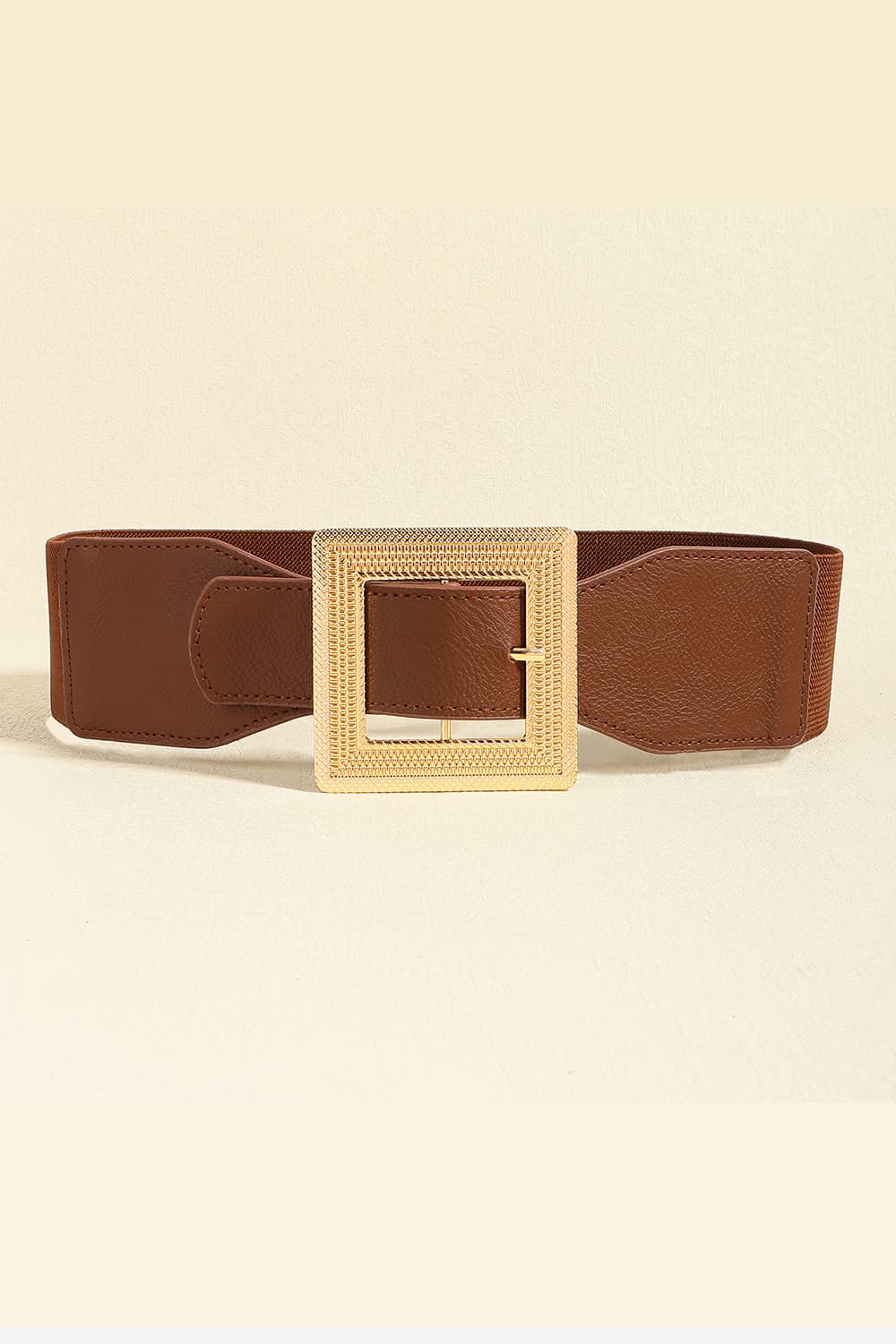 Brown elasticated waist belt with textured gold square buckle