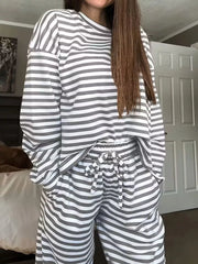 Light Gray striped pajama set with drawstring pants and long sleeve top.