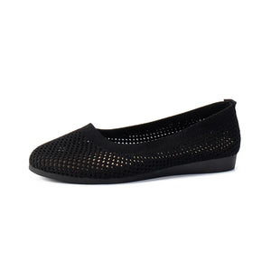 Black breathable knit ballet flats with a perforated texture.