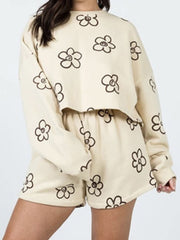 Ivory cropped lounge set with drawn floral print, long sleeves and elastic waist shorts.