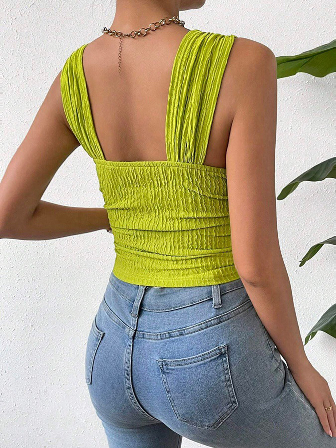 Textured crinkle strap crop top in Yellow-Green with ruched detail.