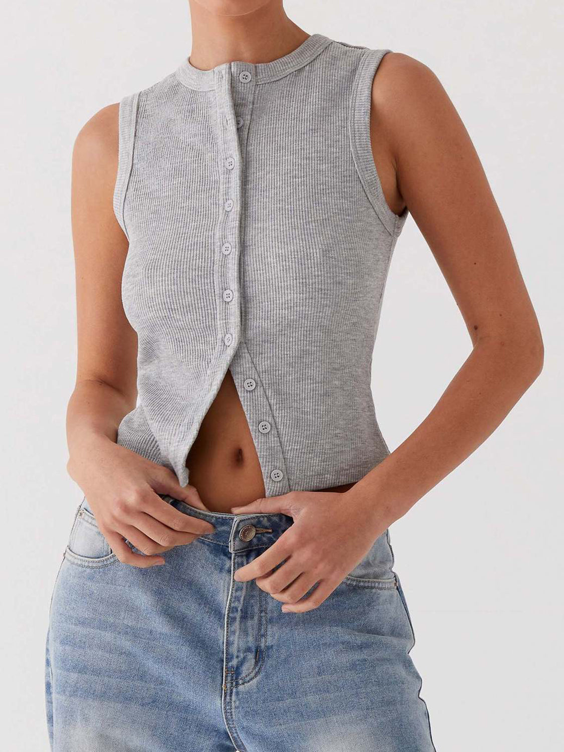 Gray ribbed knit button-down crop top with a mock neck and sleeveless design.
