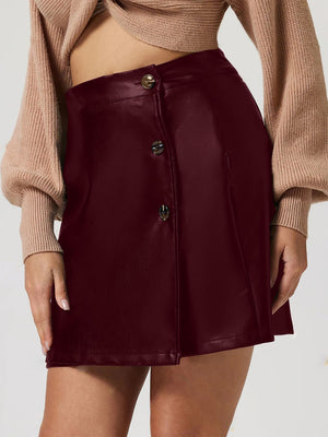Burgundy faux leather asymmetric button-front mini skirt