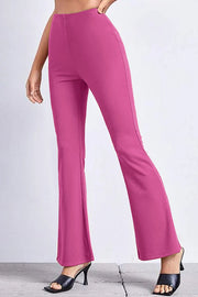 Textured flare leggings in hot pink with a subtle vertical seam detail.