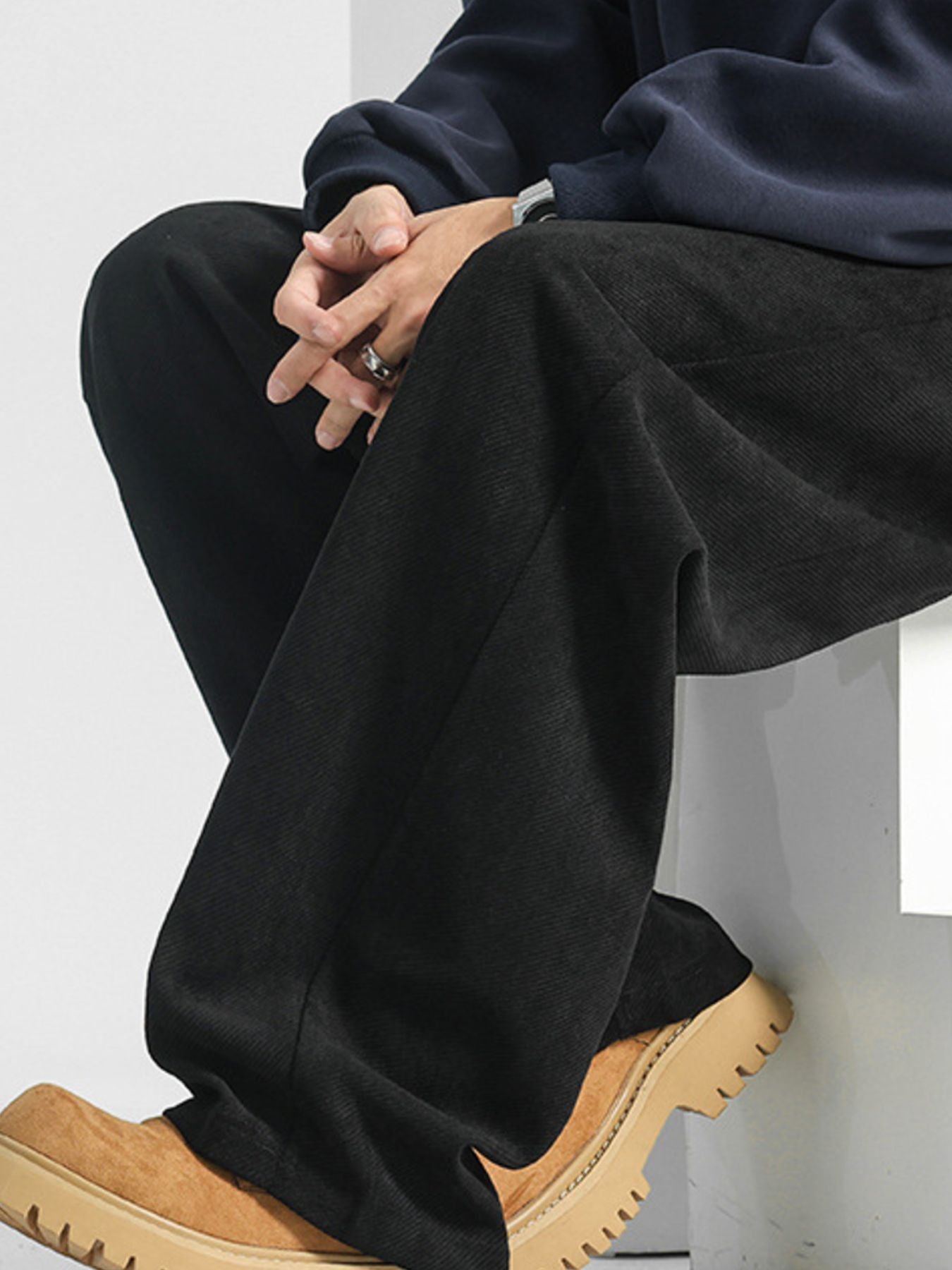 Men's black loose fit sweatpants with pockets, casual comfortable style.