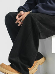 Men's black loose fit sweatpants with pockets, casual comfortable style.