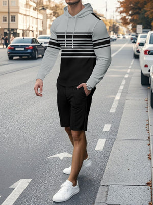 Men's black and gray textured stripe hoodie and shorts set with drawstring.