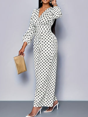 Chic white polka dot wide-leg jumpsuit with balloon sleeves and V-neck.