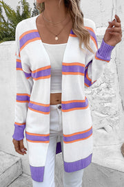 Colorblock stripe knit cardigan with open front and long sleeves.