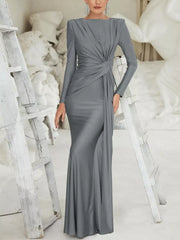 Elegant ruched long sleeve maxi dress in gray with boat neckline and bodycon fit.
