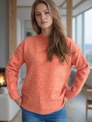 Orange textured knit crew neck pullover sweater with ribbed cuffs and hem.
