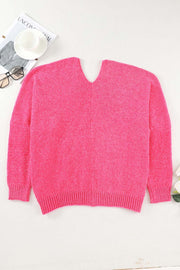 Plush pocket cardigan in hot pink with deep V-neck and ribbed cuffs and hem.