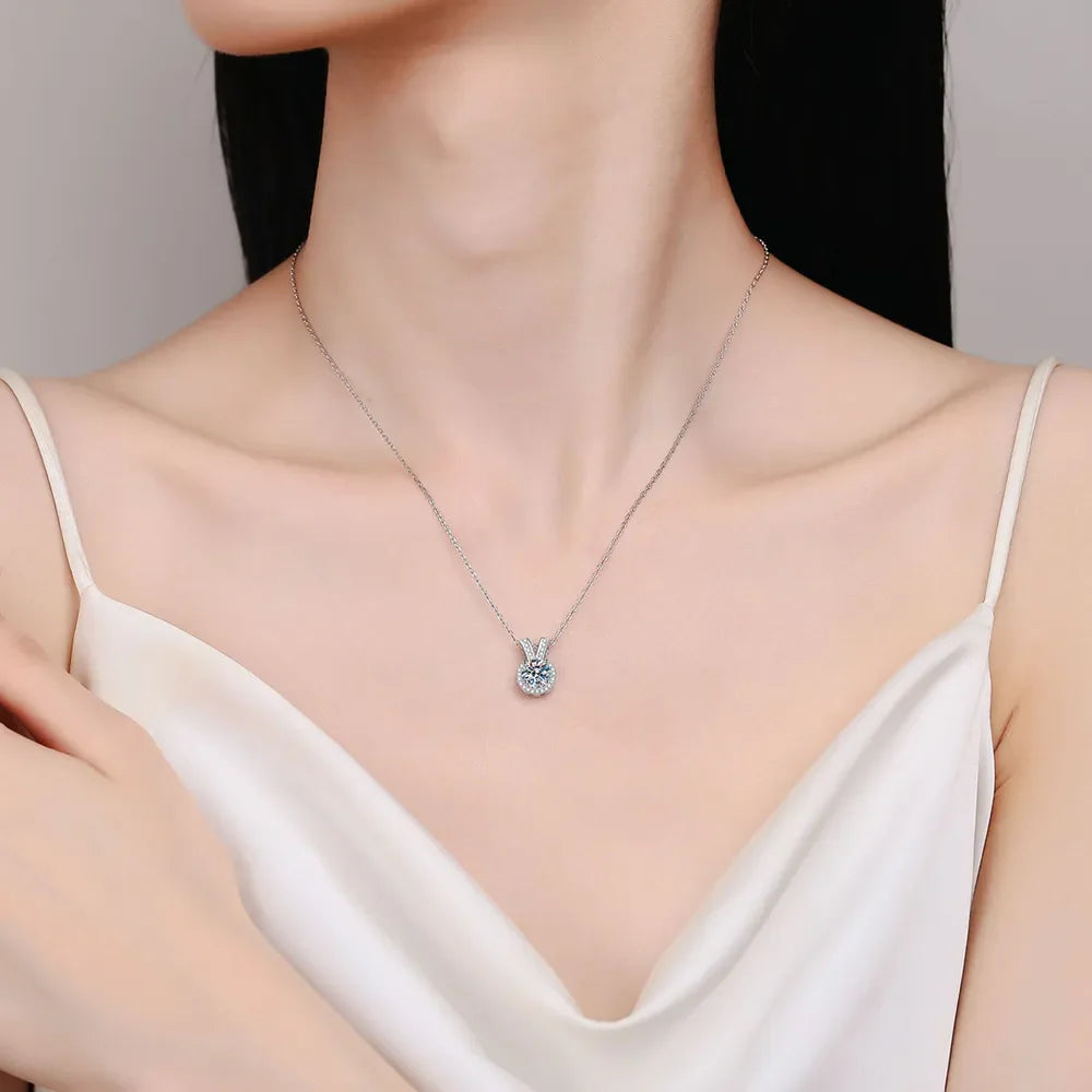 Silver halo diamond pendant necklace with rabbit ear detail on 925 sterling silver chain