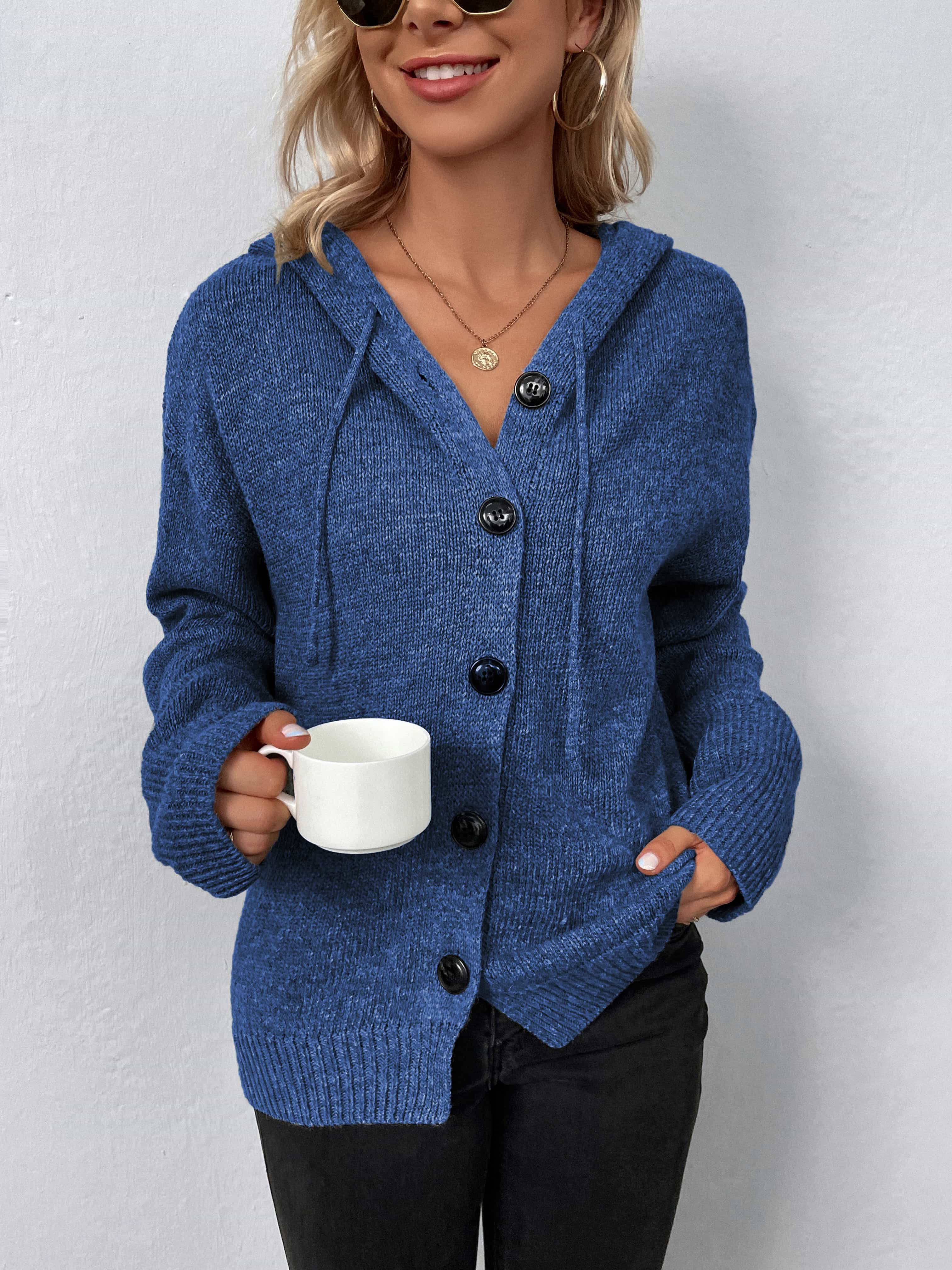 Button-front hooded knit cardigan in dark blue with drawstring and black buttons.