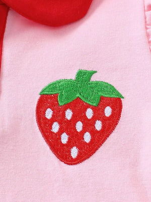 Pink cotton baby polo with strawberry embroidery and red collar detail.
