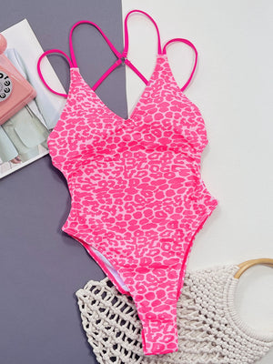 Hot pink leopard print one-piece swimsuit with strappy back detail