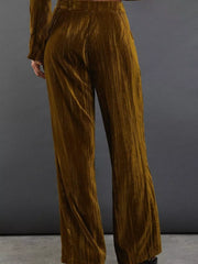 Velvet wide leg trousers in tan with vertical texture detail.