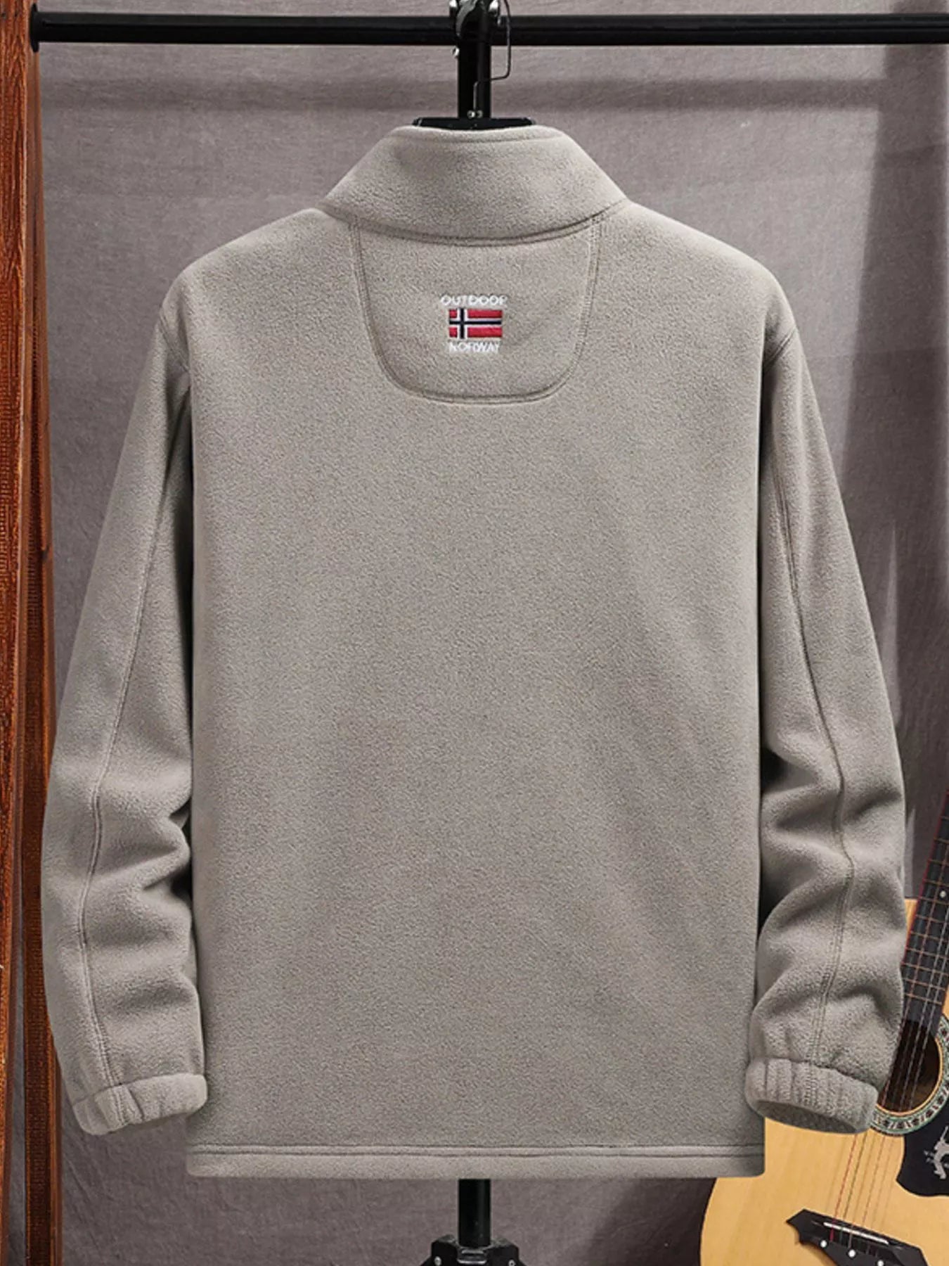 Men's grey fleece zip-up jacket with embroidered Norway flag detail on back.