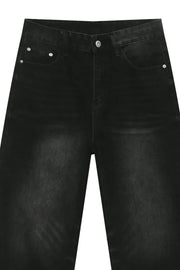 Faded black denim palazzo jeans with a high waist and wide leg.