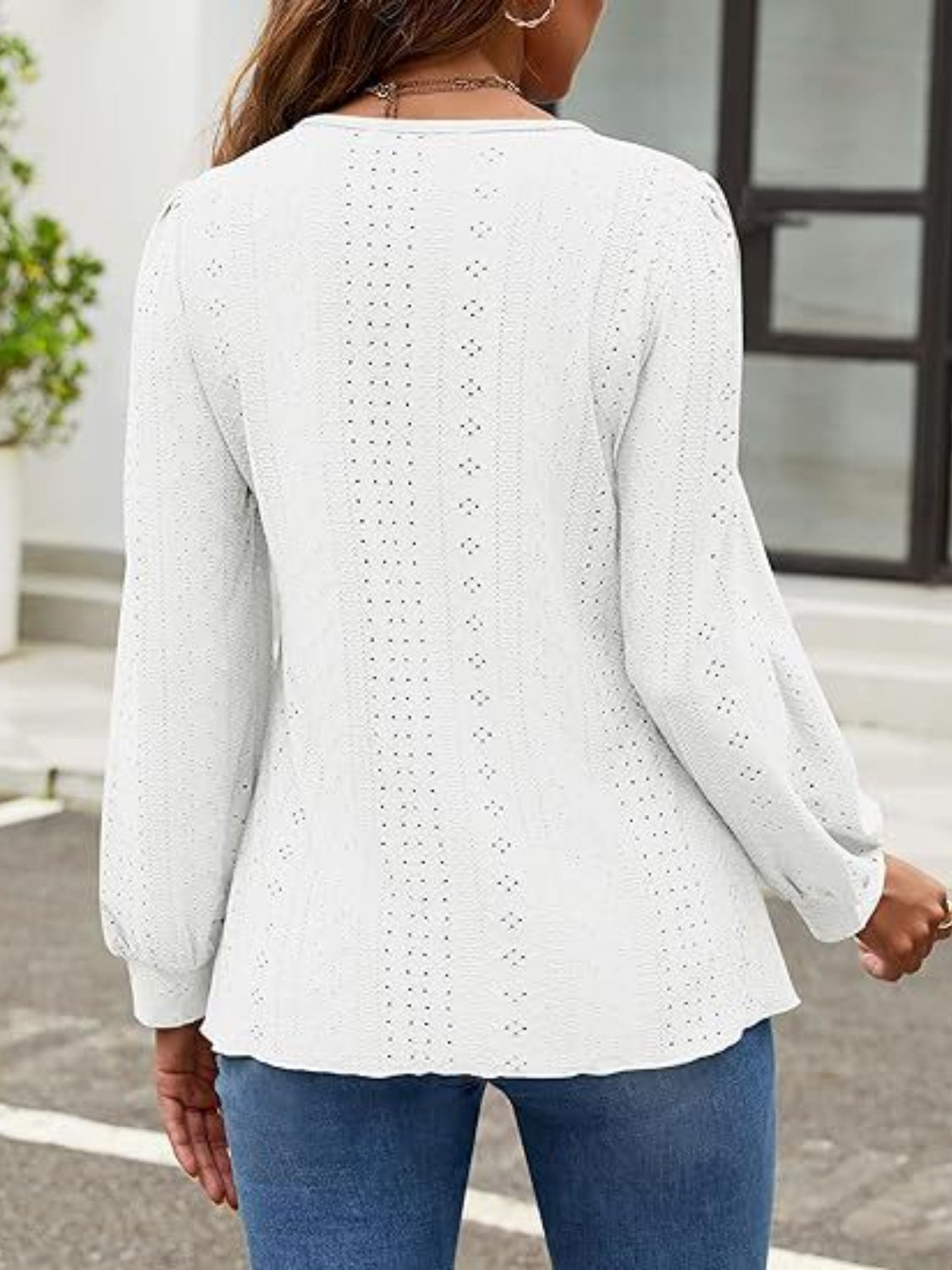 White perforated puff sleeve blouse with eyelet detail