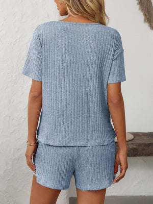 Light blue ribbed V-neck loungewear set with short sleeves and shorts.