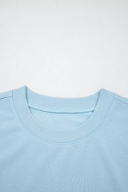Light blue cotton crew neck sweatshirt with ribbed collar detail