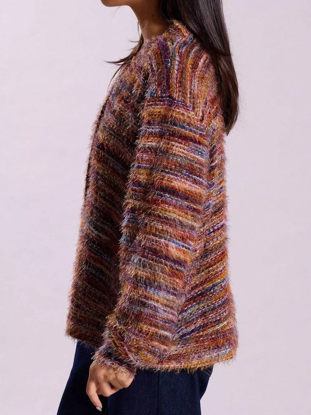 Cozy textured knit cardigan in multicolor stripes with fuzzy yarn detail and button closure.