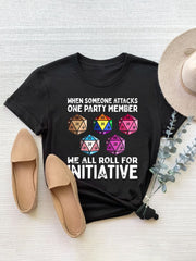 Black graphic t-shirt with dice roll design and text "WE ALL ROLL FOR INITIATIVE