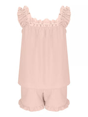 Pale blush ruffled pajama set with square neckline and ruffled shorts.