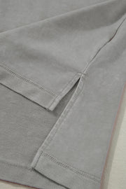 Gray acid wash tee with side slits and layered sleeves detail