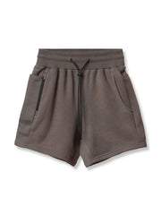 Performance fleece jogger shorts in coffee brown with drawcord and zippered pocket detail.