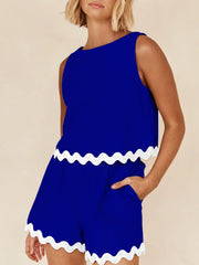 Royal blue scalloped edge tank and short co-ord set with white trim.