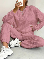 Dusty Pink cable knit loungewear set with crew neck sweatshirt and cuffed pants.