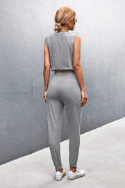 Gray cropped muscle tank and jogger set with elastic waistband and cuffs.