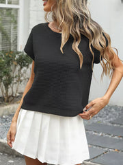 Black relaxed openwork knit top with short sleeves and crew neck.