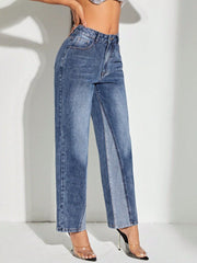 Panelled denim straight leg jeans in medium wash cotton with a button fly.