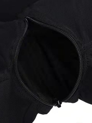Black shaping romper with a discreet zipper detail.