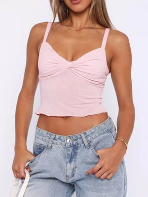 Pink cami top with twisted front detail and cropped length