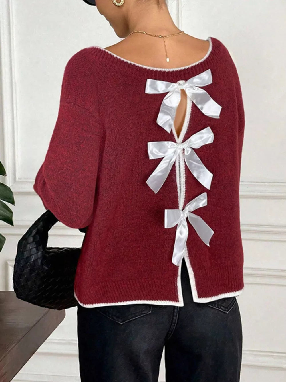 Burgundy knit sweater with white bowknot back detail and contrast trim