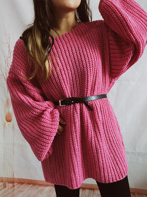 Hot Pink oversized ribbed knit sweater with belted waist and wide sleeves.