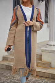 Khaki long cardigan with blue trim and fringed hemline, featuring geometric stripe detail on sleeves.
